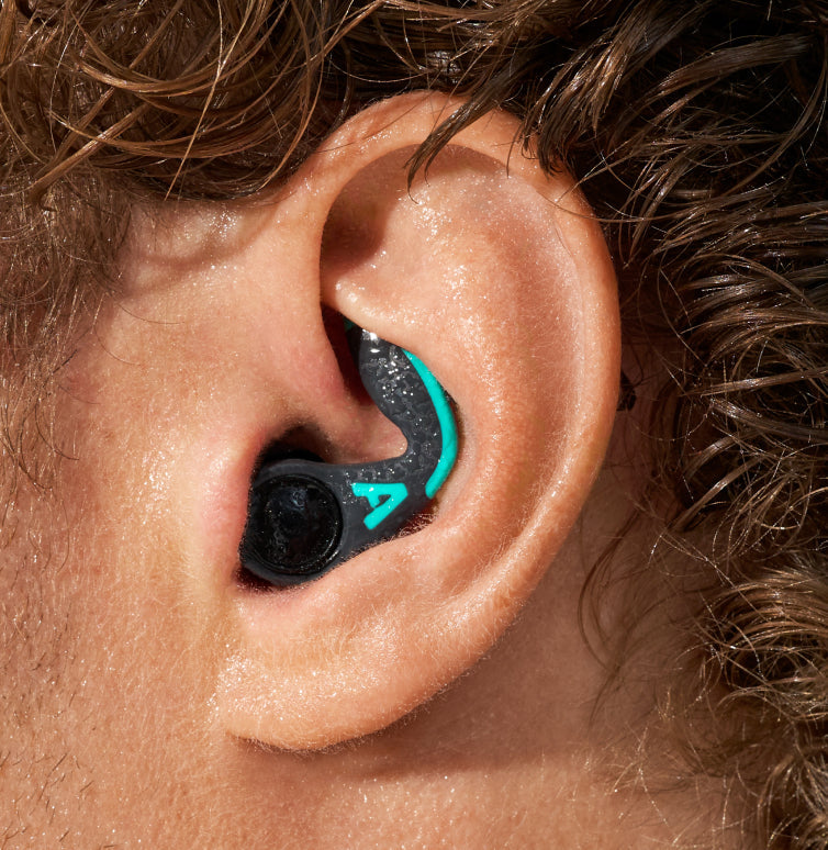 A man wearing Alpine WaterSafe Pro.