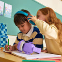 Two children with educational tools in a classroom setting