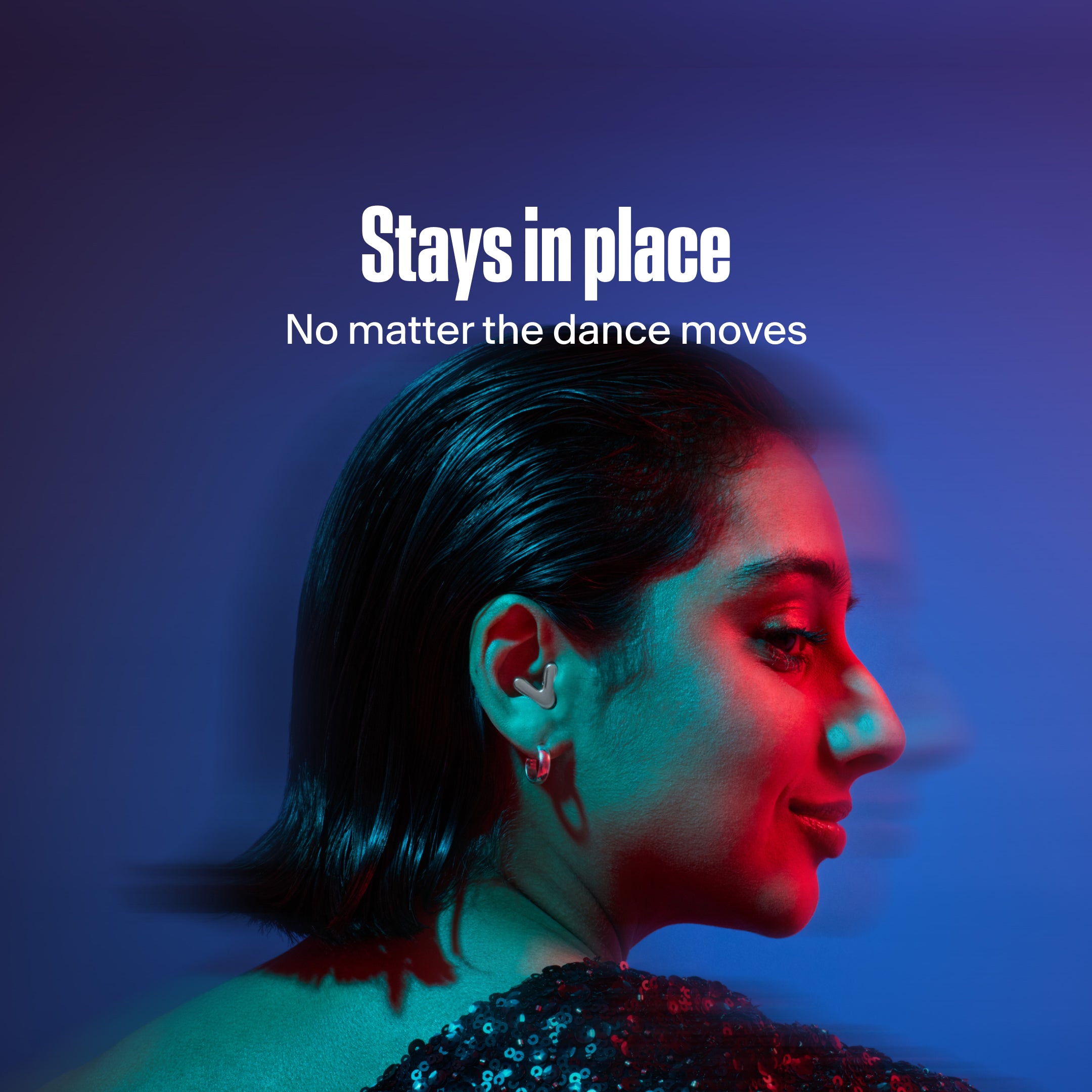 woman wearing alpine tune in silver dancing with them