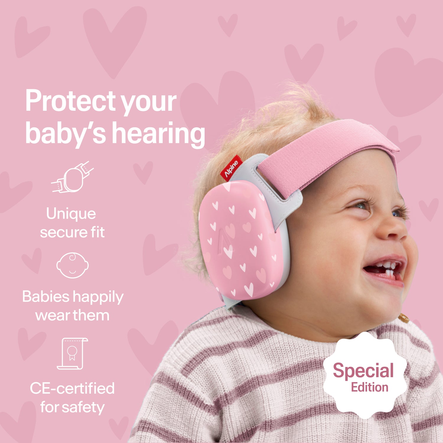 Happy baby wearing heart-print Alpine ear muffs with secure fit, CE-certified hearing protection 