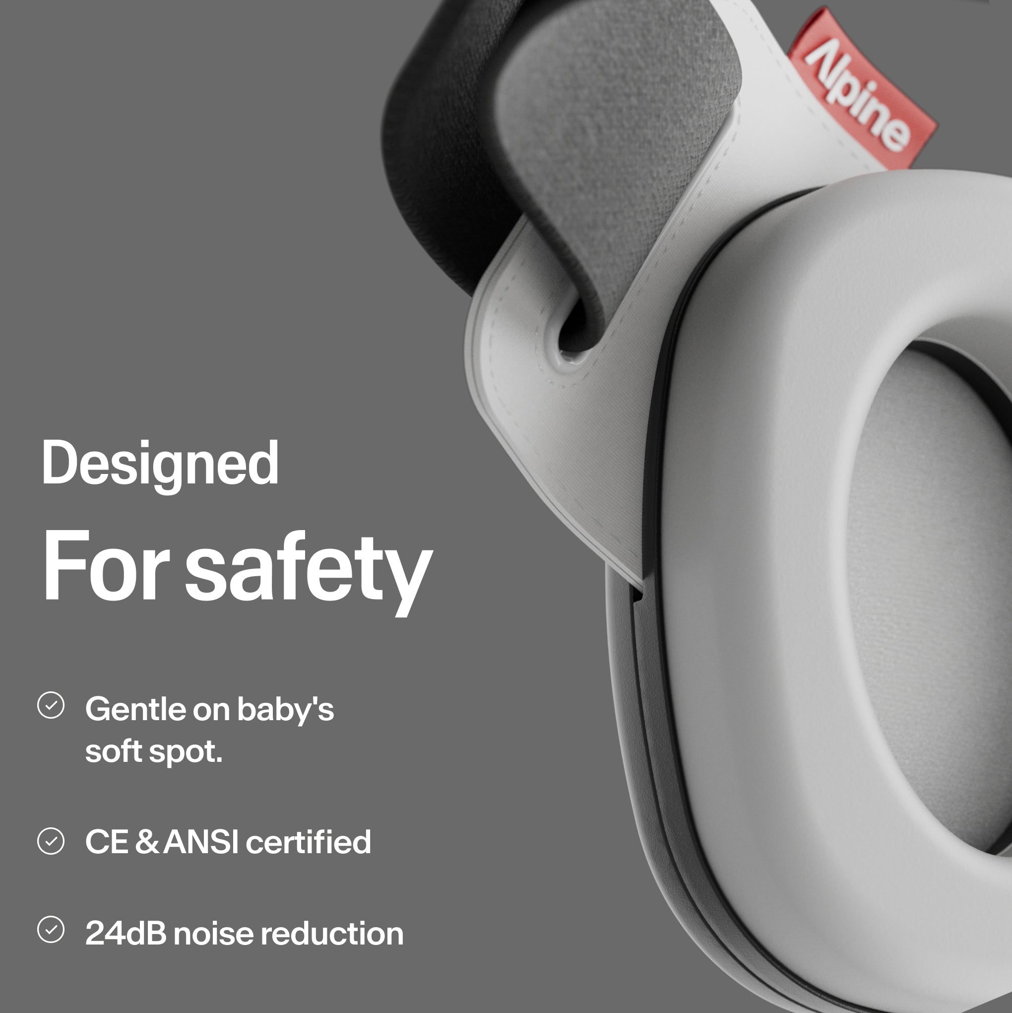 Close-up Alpine Muffy Baby in black with explanation about product safety 