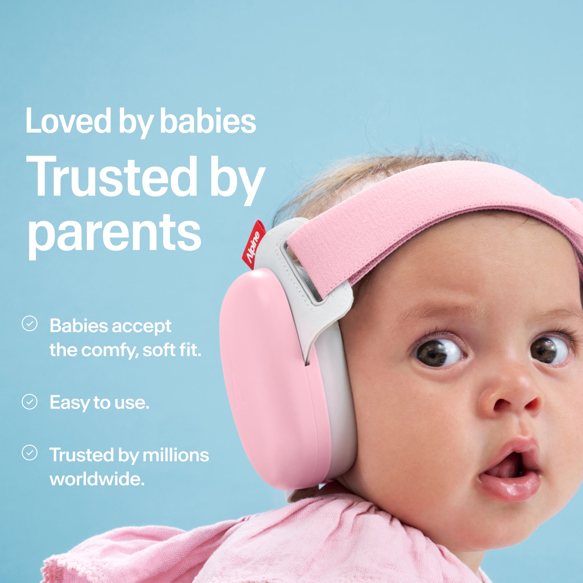 Baby wearing Alpine Muffy Baby in rose pink on the head 