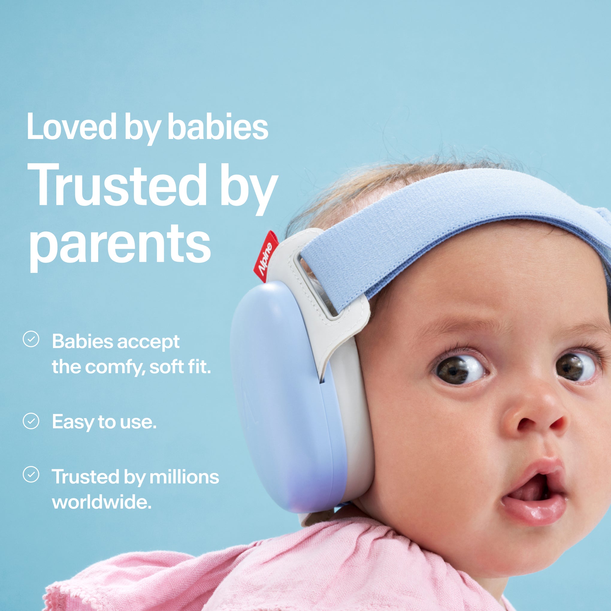 Baby wearing Alpine Muffy Baby in sky blue on the head 