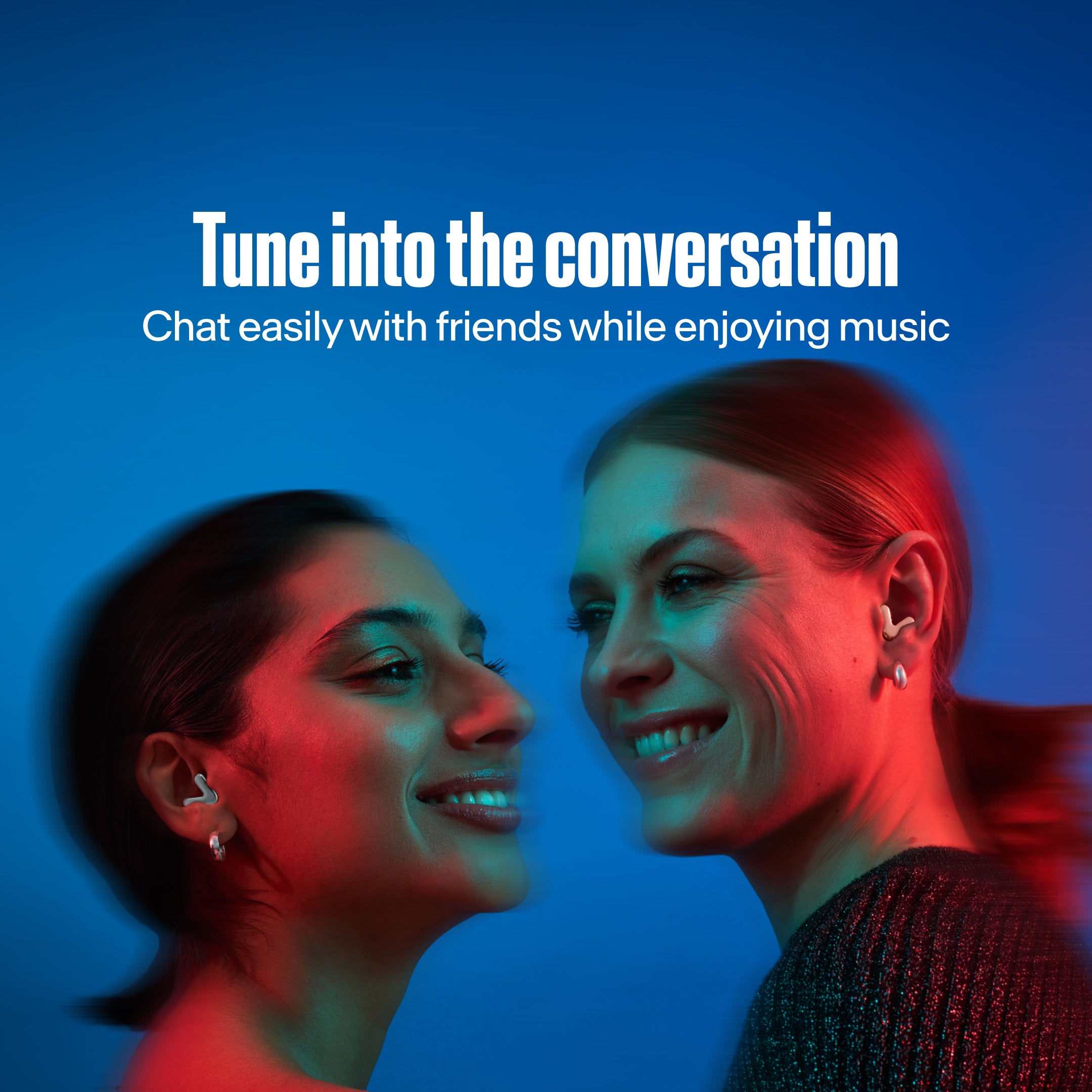 Two women with alpine tune in neon silver and rose gold dancing together