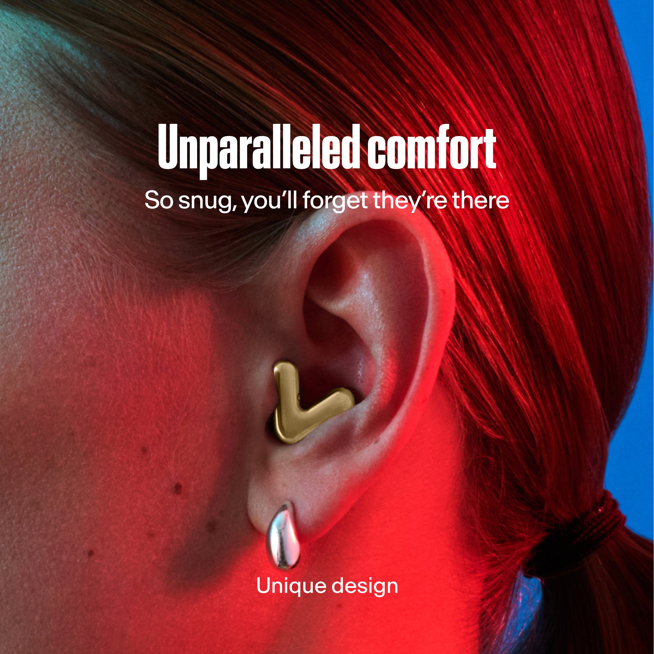 Detailed image of an ear with an Alpine Tune earplug in gold showing the snug fit in ear 