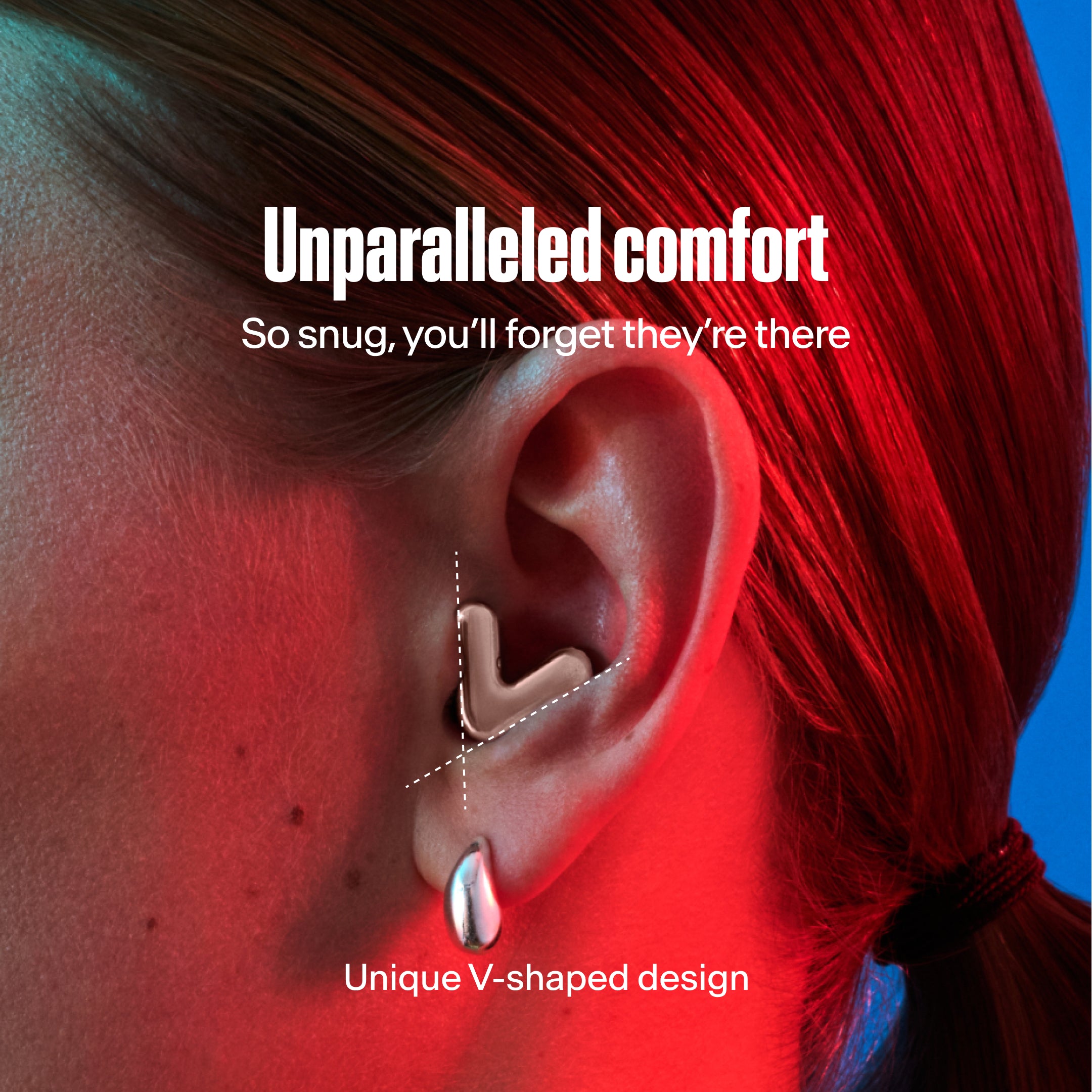 Detailed image of an ear with an Alpine Tune earplug in rose gold showing the snug fit in ear  